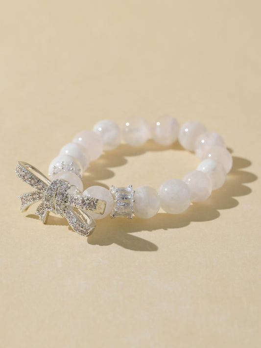 White Snowflake Stone Bracelet with Bow Charm