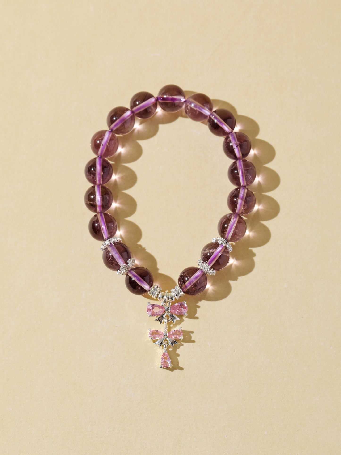 Amethyst Bracelet with Pink Butterfly Charm
