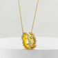 Golden hourglass pendant necklace in brushed gold with cubic zirconia embellishments, exuding elegance and modern charm.