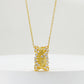 Golden hourglass pendant necklace in brushed gold with cubic zirconia embellishments on a delicate chain.