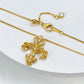 Baroque gold fleur-de-lis pendant necklace with cubic zirconia accents, highlighting vintage elegance and charm.